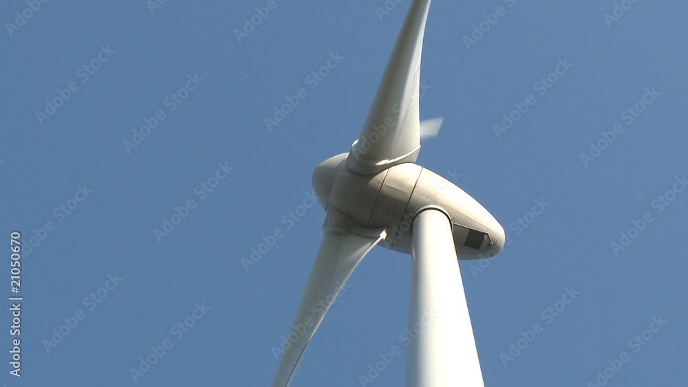 Wind power turbine on blue sky Wind power turbine on blue sky