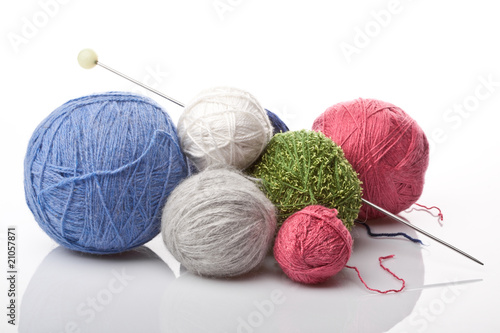 colorful yarn balls on white