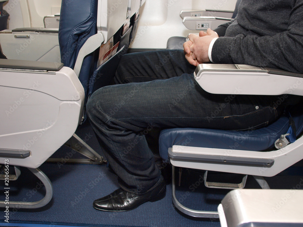 Obraz premium Brak miejsca na nogi w samolocie