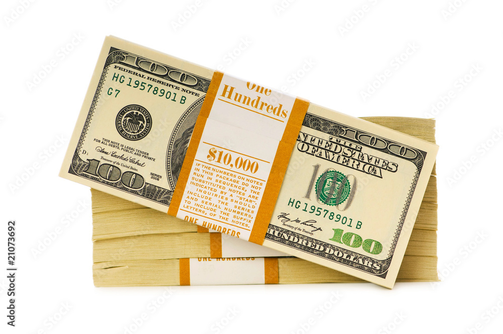 Stack of dollars isolated on the white Stack of dollars isolated on the white