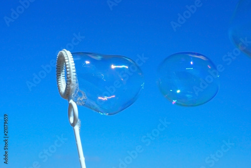 Real soap-bubbles on blue sky