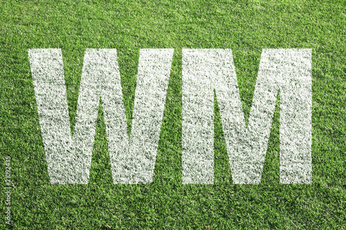 WM - Kreideschrift auf Fußballplatz