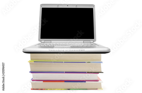Laptop lying on book