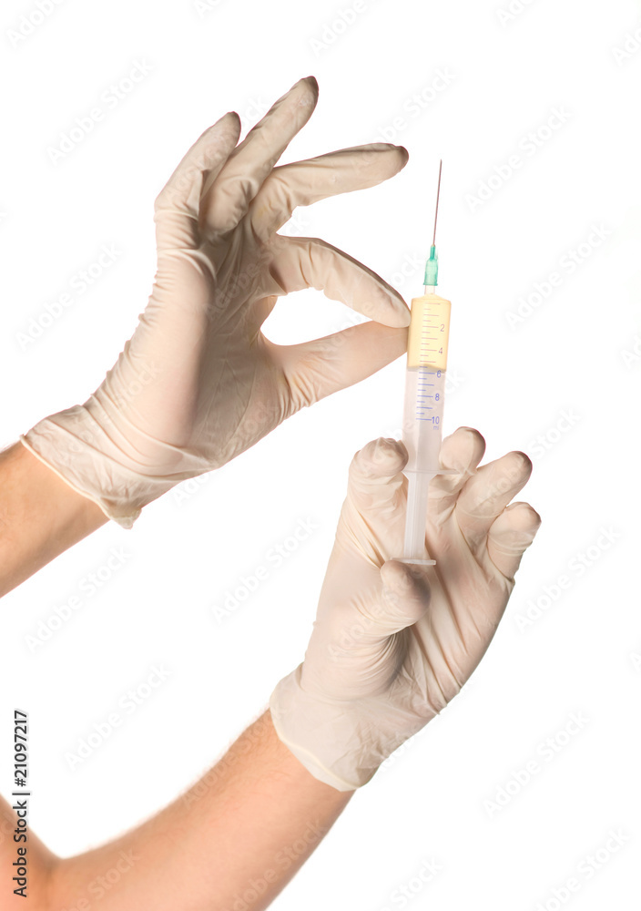 hands holding syringe before making injection hands holding syringe before making injection