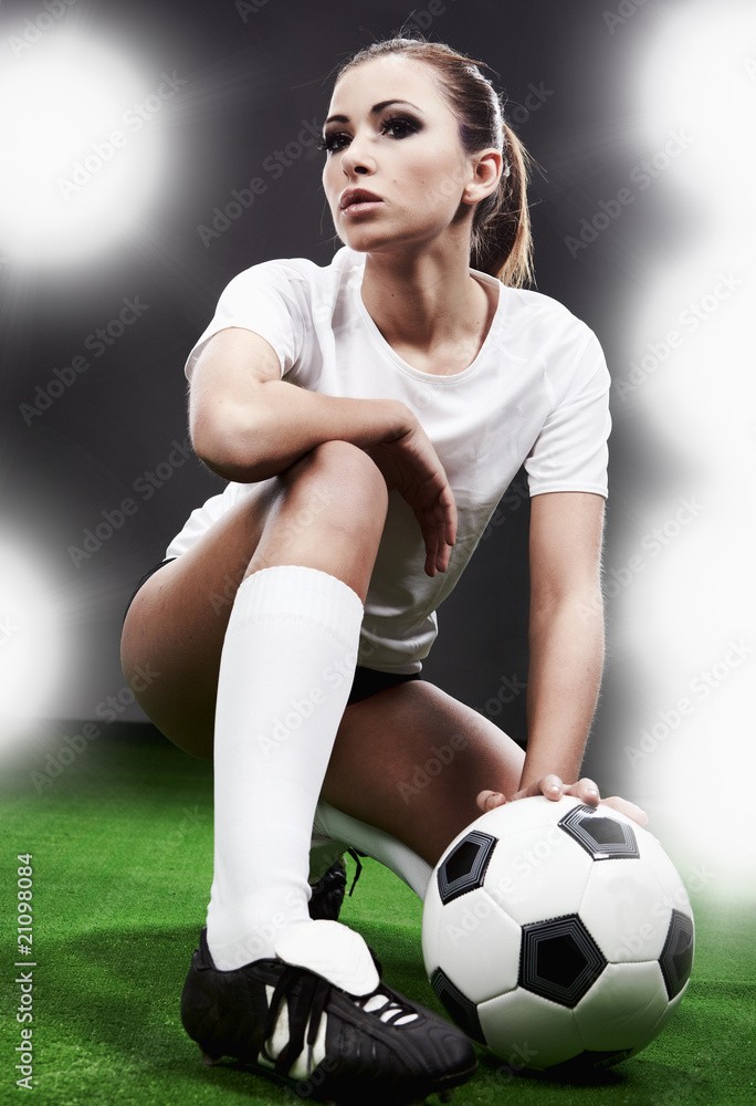Sexy soccer player, woman on playing field Stock Photo | Adobe Stock