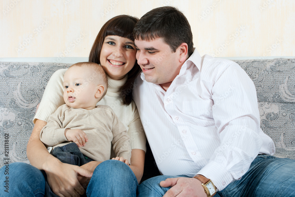 happy family - father, mother and baby happy family - father, mother and baby