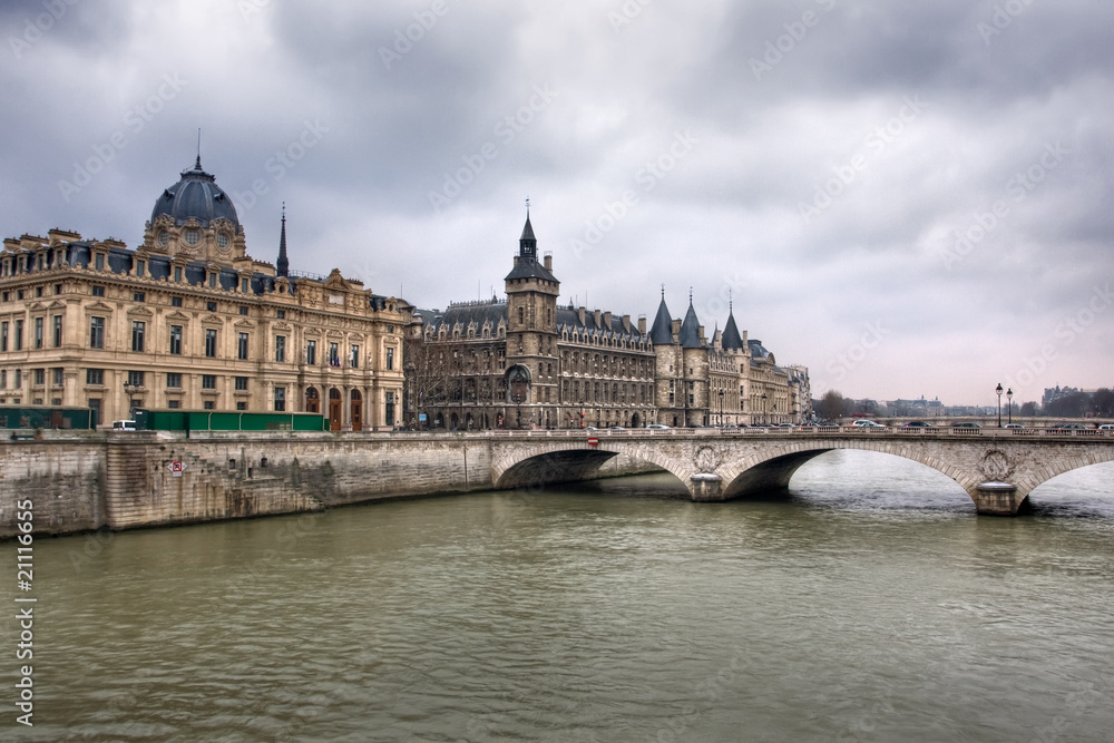 La Conciergerie and Pont au Change, over the Seine river - Paris