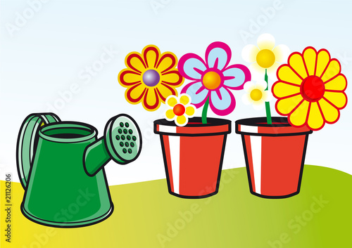 macetas con flores y regadera