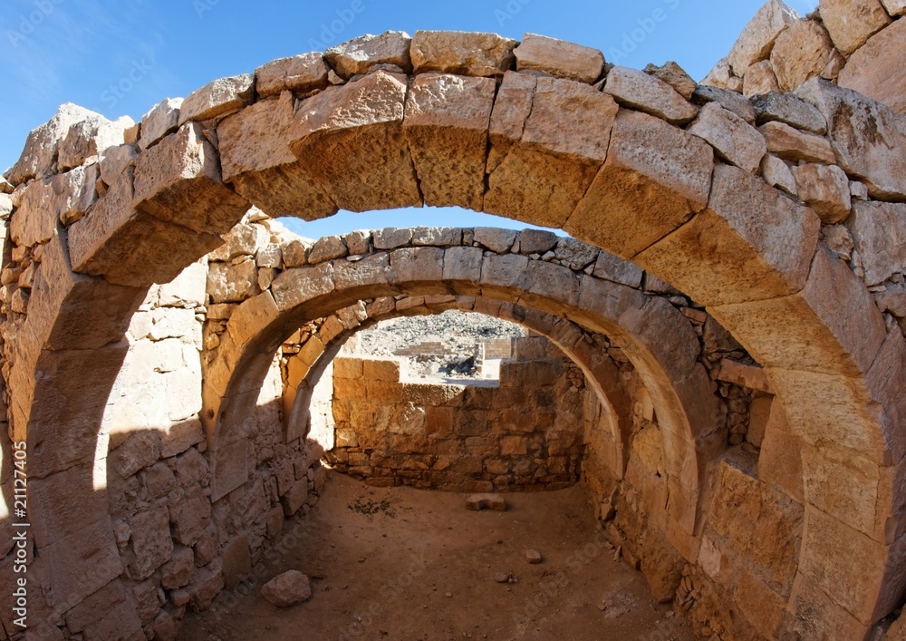 Converging ancient stone arches