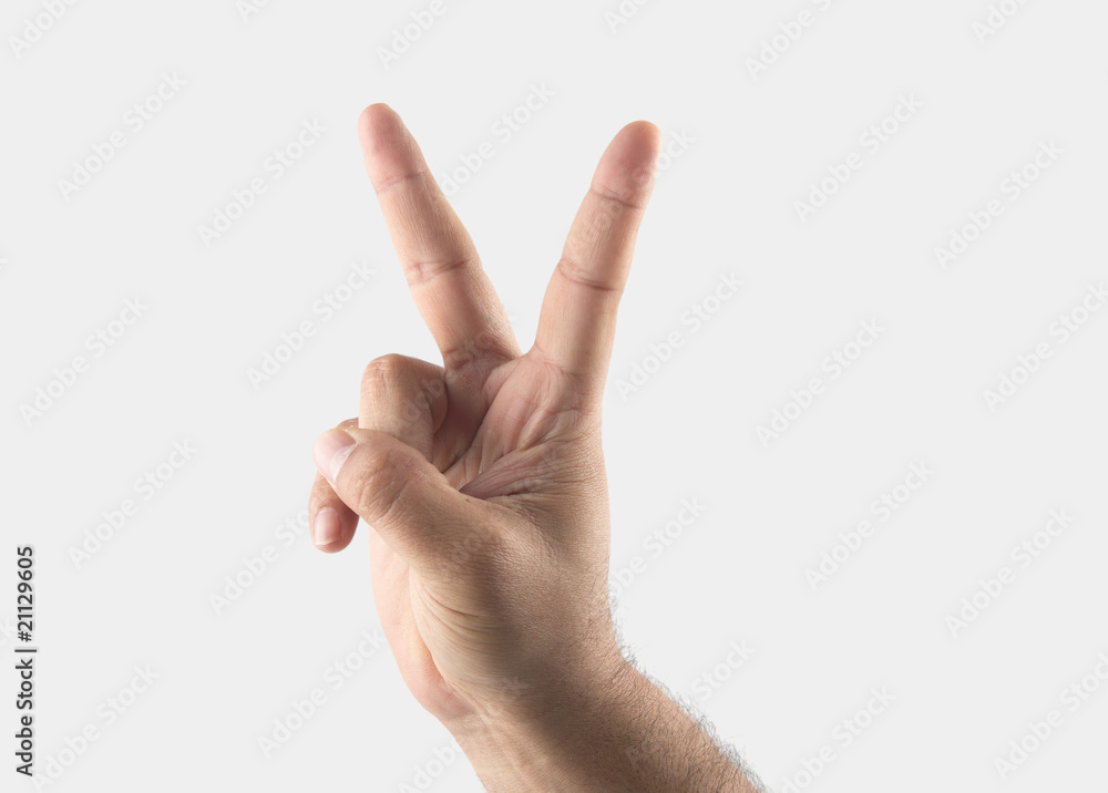 male hand with two fingers up in the peace or victory symbol male hand with two fingers up in the peace or victory symbol