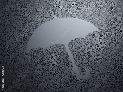 Regenschirm auf schwarzem Hintergrund mit Wassertropfen photo