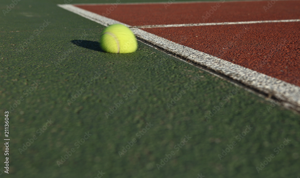 The impact - Tennis ball bouncing off the tennis court