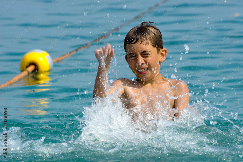 a young boy's swimming