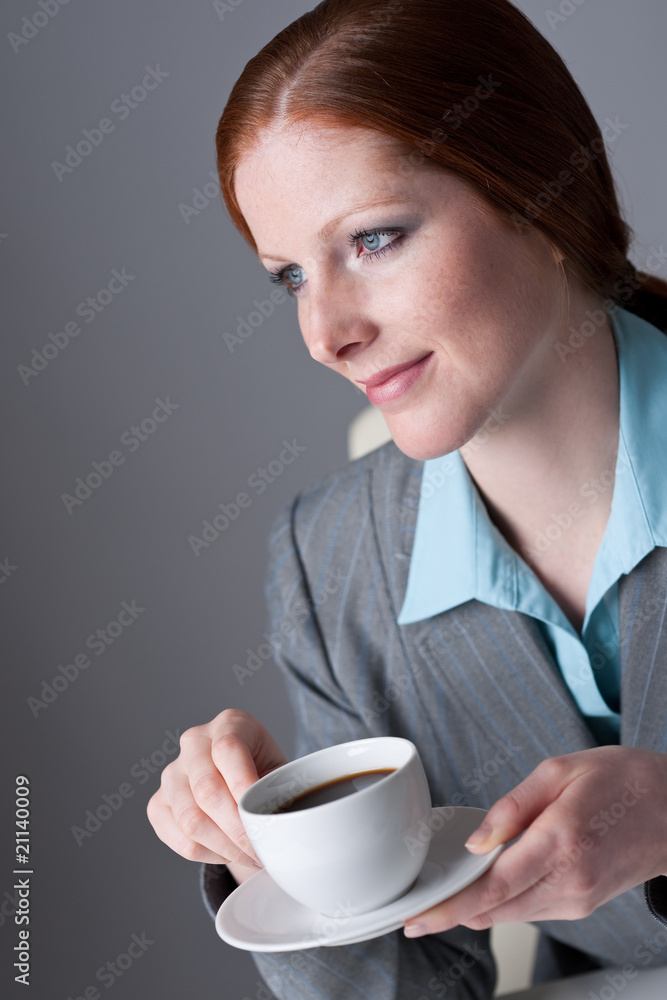 Successful business woman having coffee break Successful business woman having coffee break