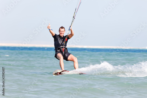 Kiteboarder enjoying surfing