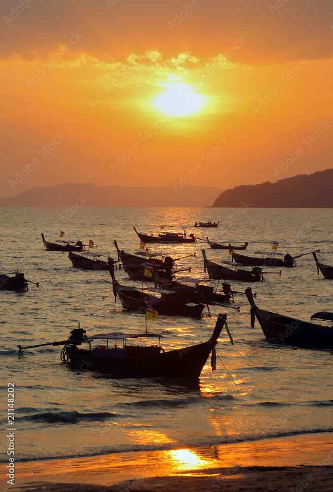 Longtail boats at sunset, Thailand