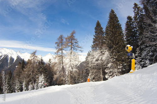 snow cannon in italian Dolomites