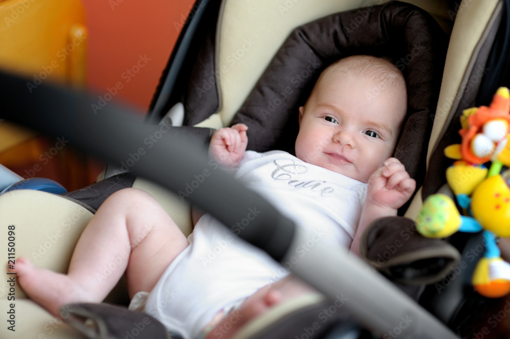 Little two month old baby in a car seat