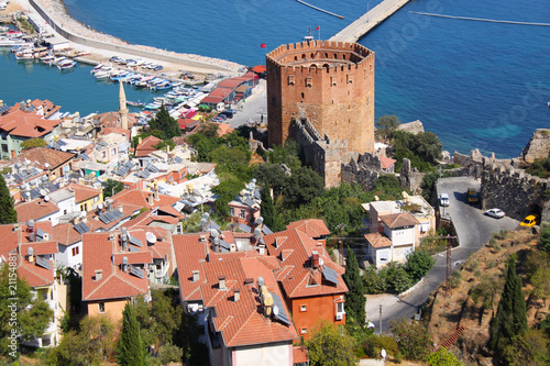 Port Alanya and red brick tower photo