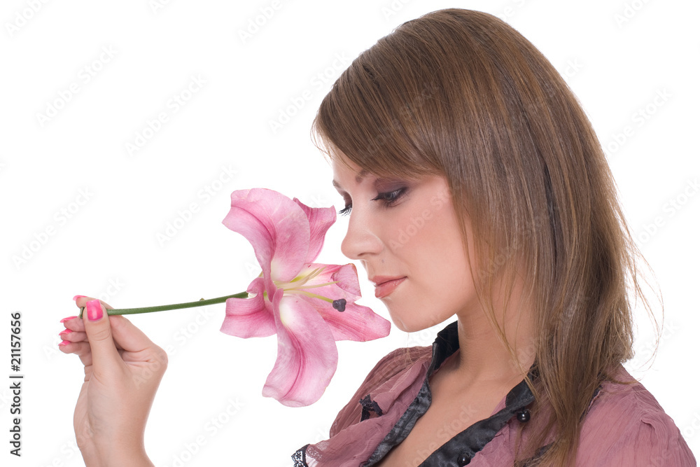 Fototapeta premium Close up portrait of young beautiful woman with flower
