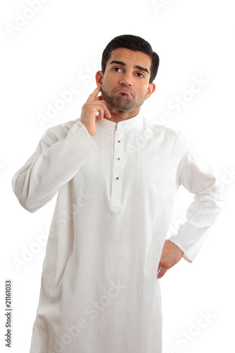 Worried troubled ethnic man wearing a kurta © Leah-Anne Thompson