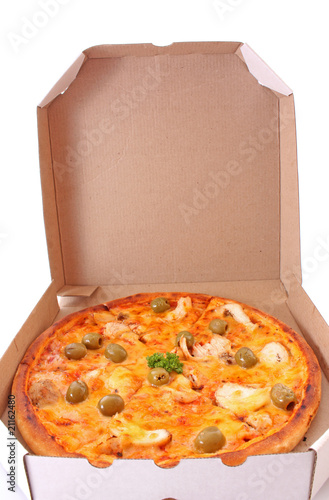 Whole  pizza with olives in box over white background