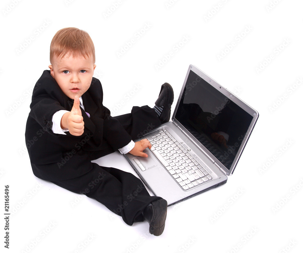 Little child and laptop Isolated on white background Little child and laptop Isolated on white background
