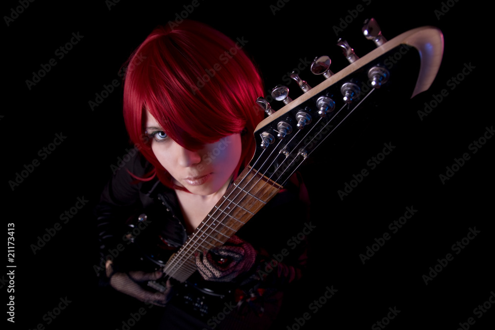 Obraz premium Sensual girl with guitar, high angle view