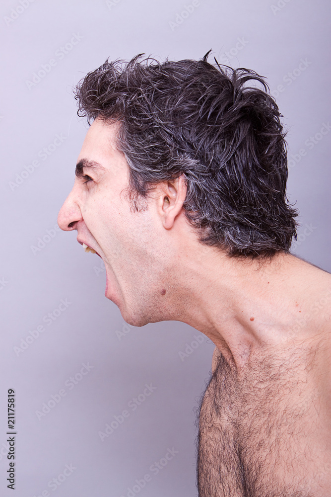 Fototapeta premium Angry young man screaming