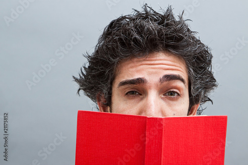 Student reading a suspense novel