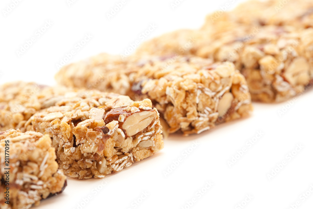 Obraz premium Row of Several Granola Bars Isolated on White