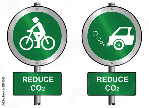 Environmental reduce CO2 signs mounted on post
