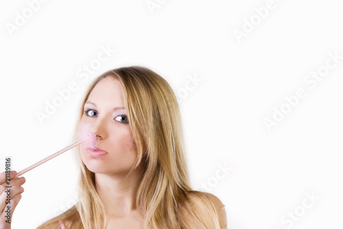The girl on a white background. Make-up.
