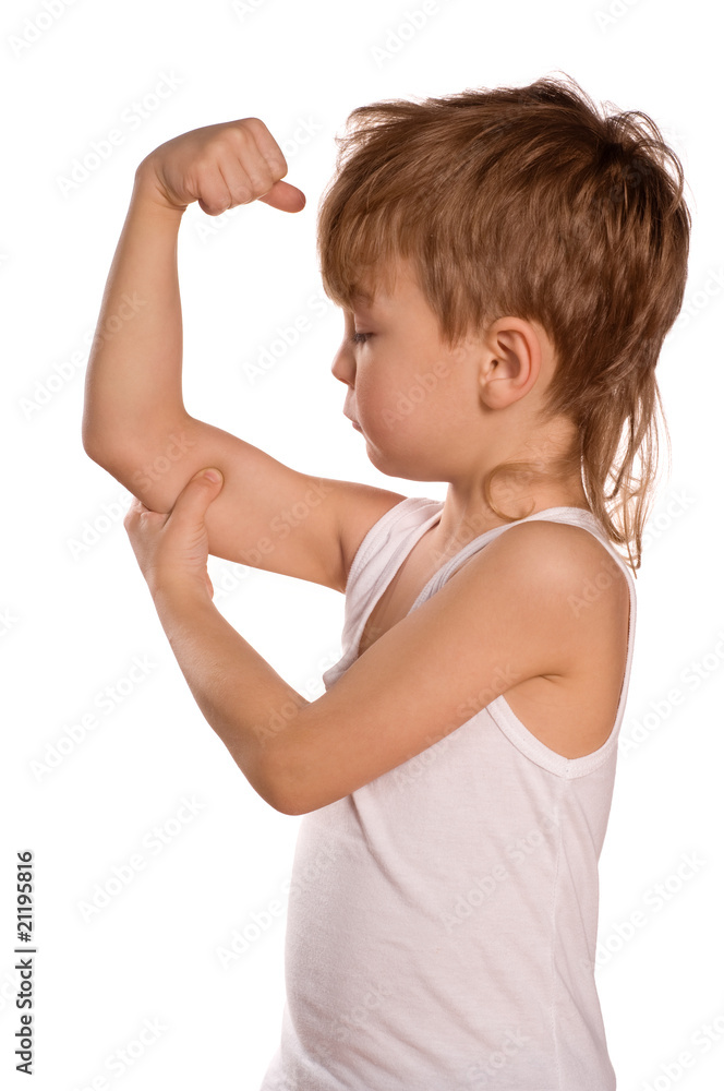 Little boy flexing biceps