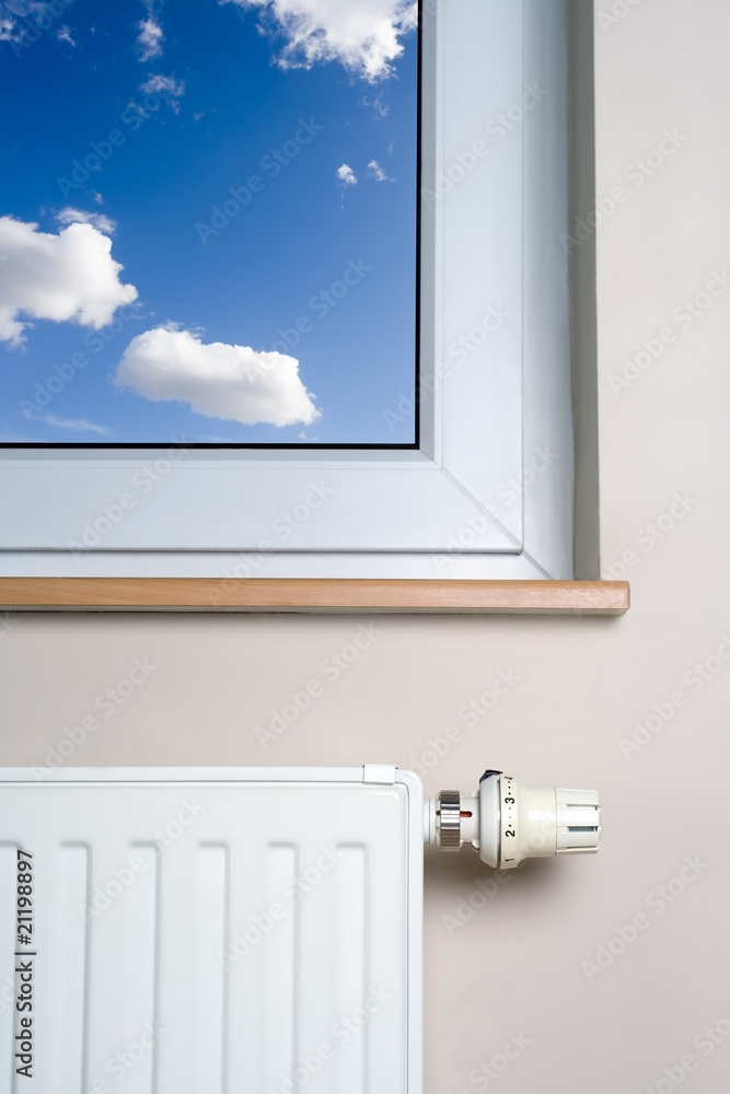 Radiator and blue sky in home interior Radiator and blue sky in home interior