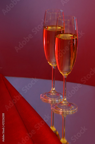 Two wine glasses with champagne photo