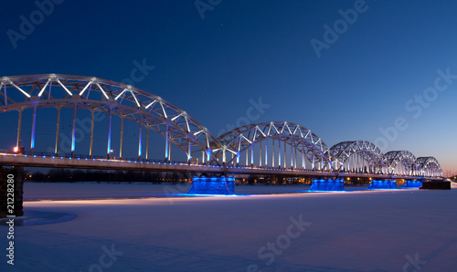 Railway bridge at night in winter