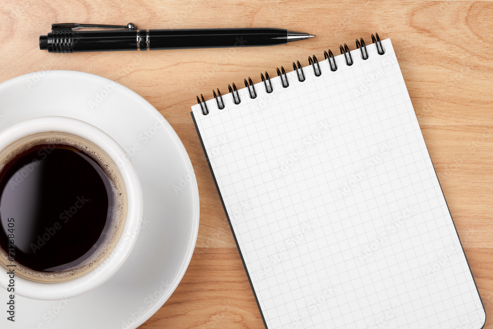 Espresso cup with blank notepad and pen Espresso cup with blank notepad and pen