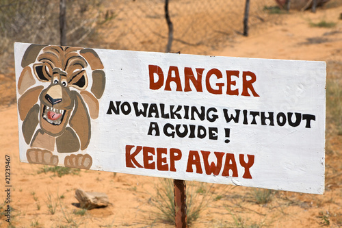 Danger lion signboard on fence in Harnas foundation photo