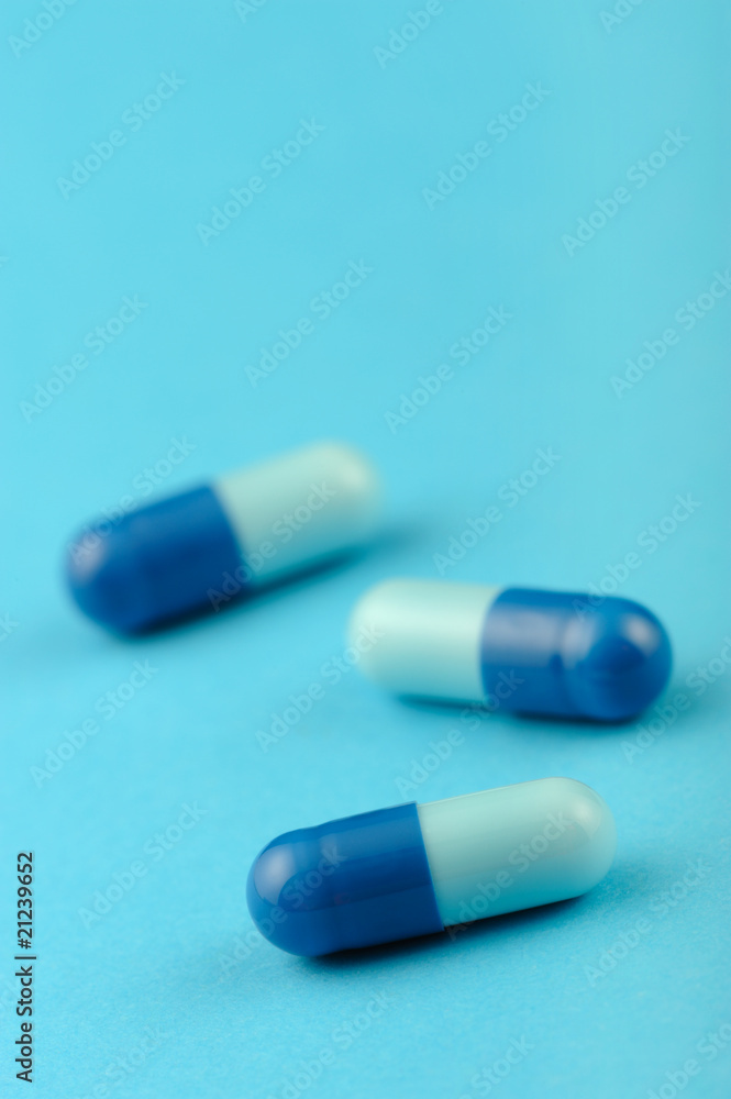 set capsules on blue background set capsules on blue background