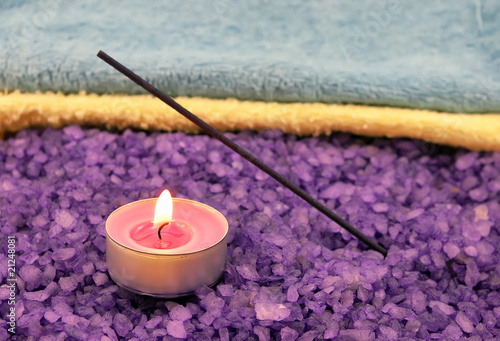 Violet  salt with candle and insense stick photo