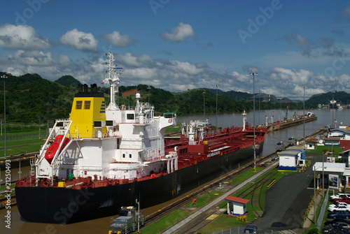 Boat entering the Panama Canal at Miraflores photo