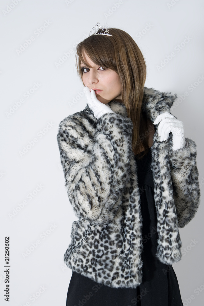 Fashionable teenager girl in fur coat Fashionable teenager girl in fur coat