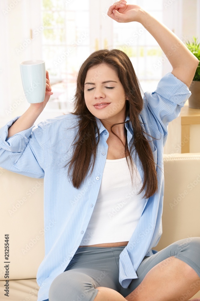 Girl stretching on couch