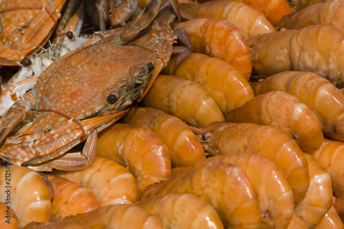 Cooked crabs and prawns on the market of Thailand