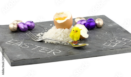 A grey slate with easter decorations