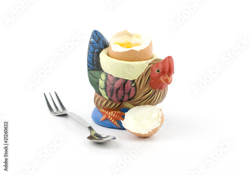 Rooster shaped egg holder with an egg