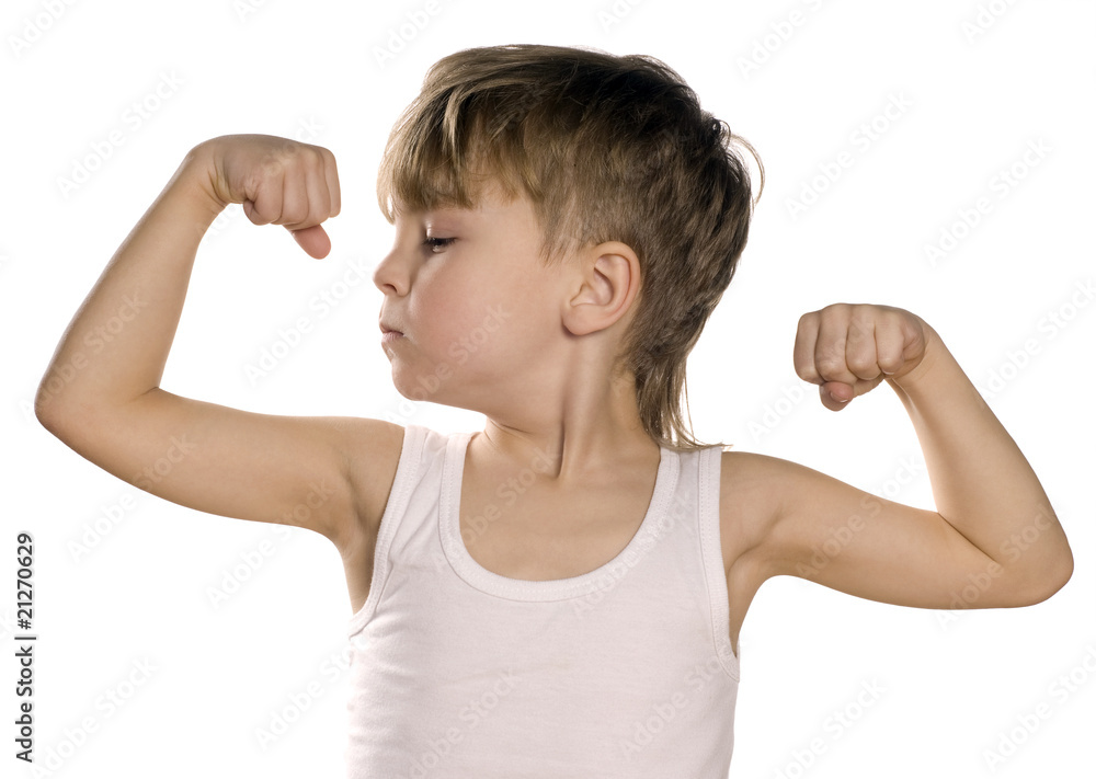 Little boy flexing biceps