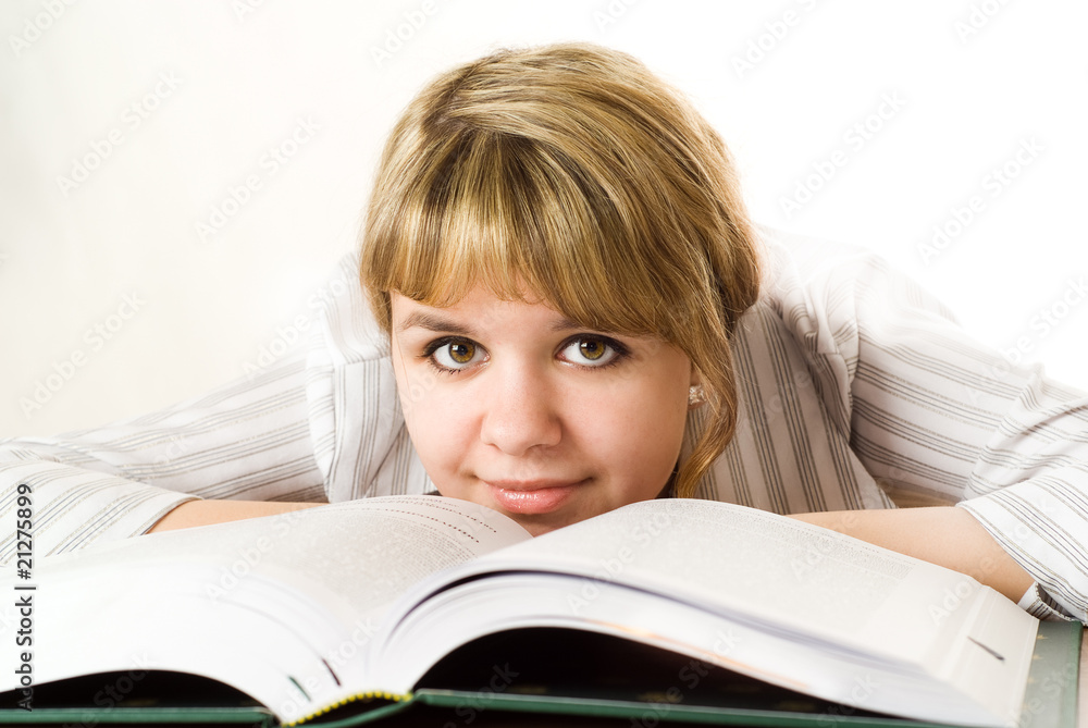 young student with a book on white background young student with a book on white background