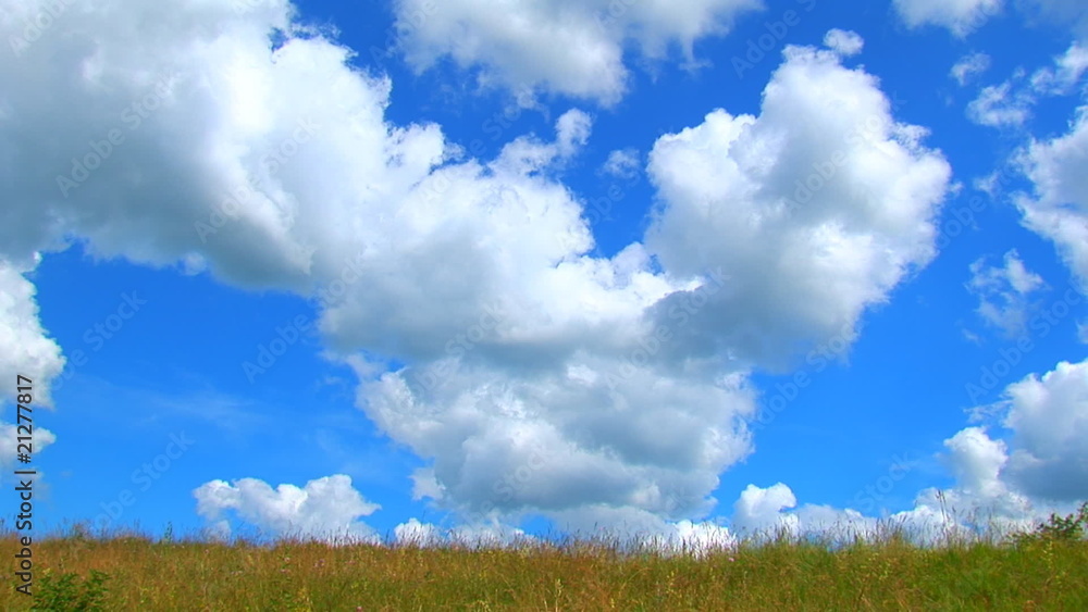 Green meadow under clouds Green meadow under clouds